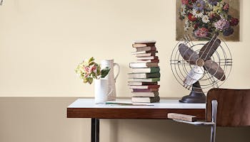 Desk with two-tone neutral walls behind