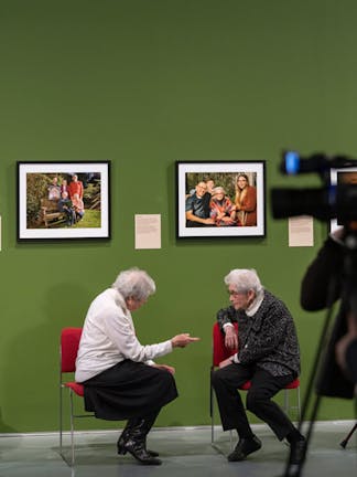 © IWM Holocaust survivors Marianne Philipps and Anne Super at the opening of Generations: Portraits of Holocaust Survivors at IWM North (27 January – Summer 2023). Photo: Andrew Brooks