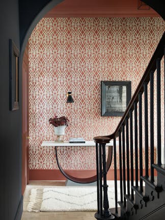 Hallway arch with Brook Street pink wallpaper